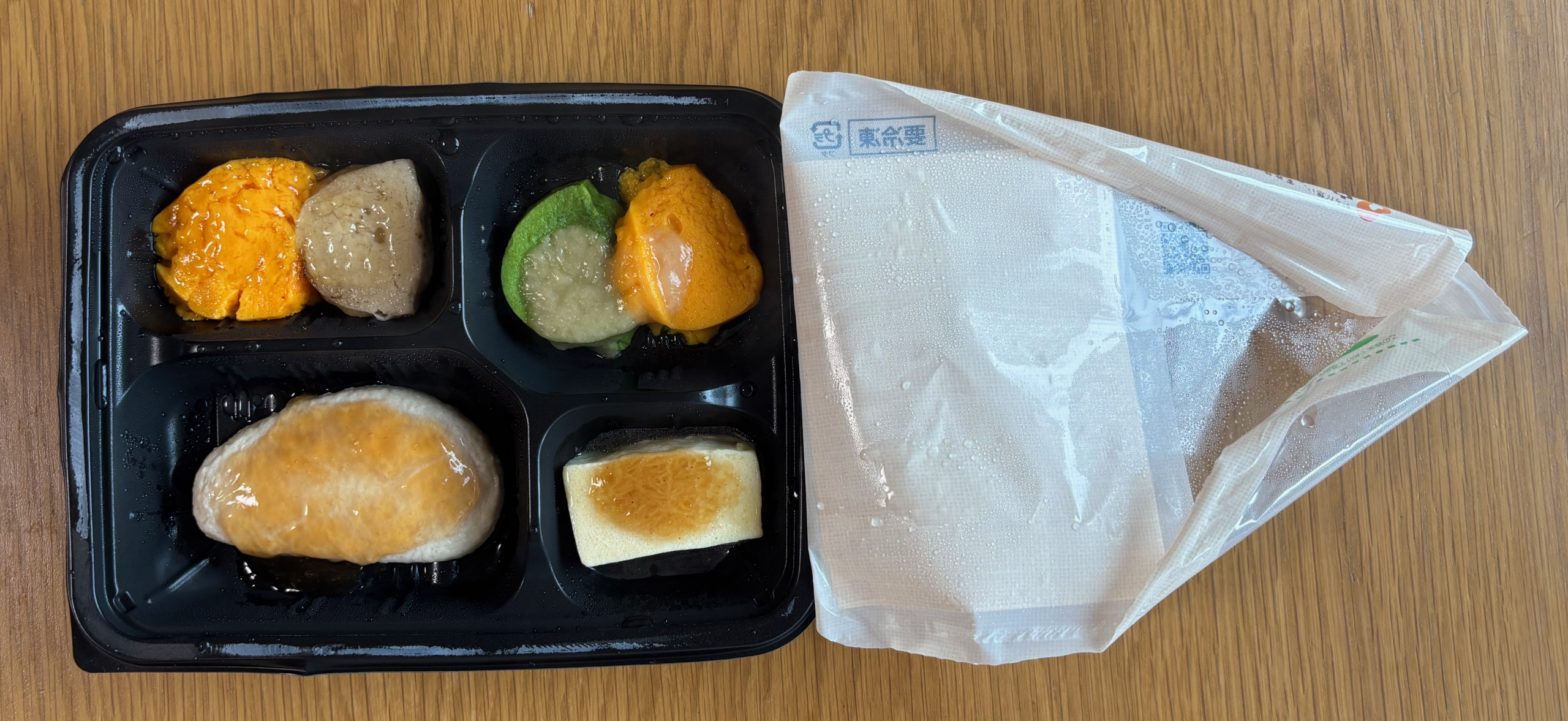 温めたあとにふたをはがしたウェルネスダイニングのまろやか酢豚
